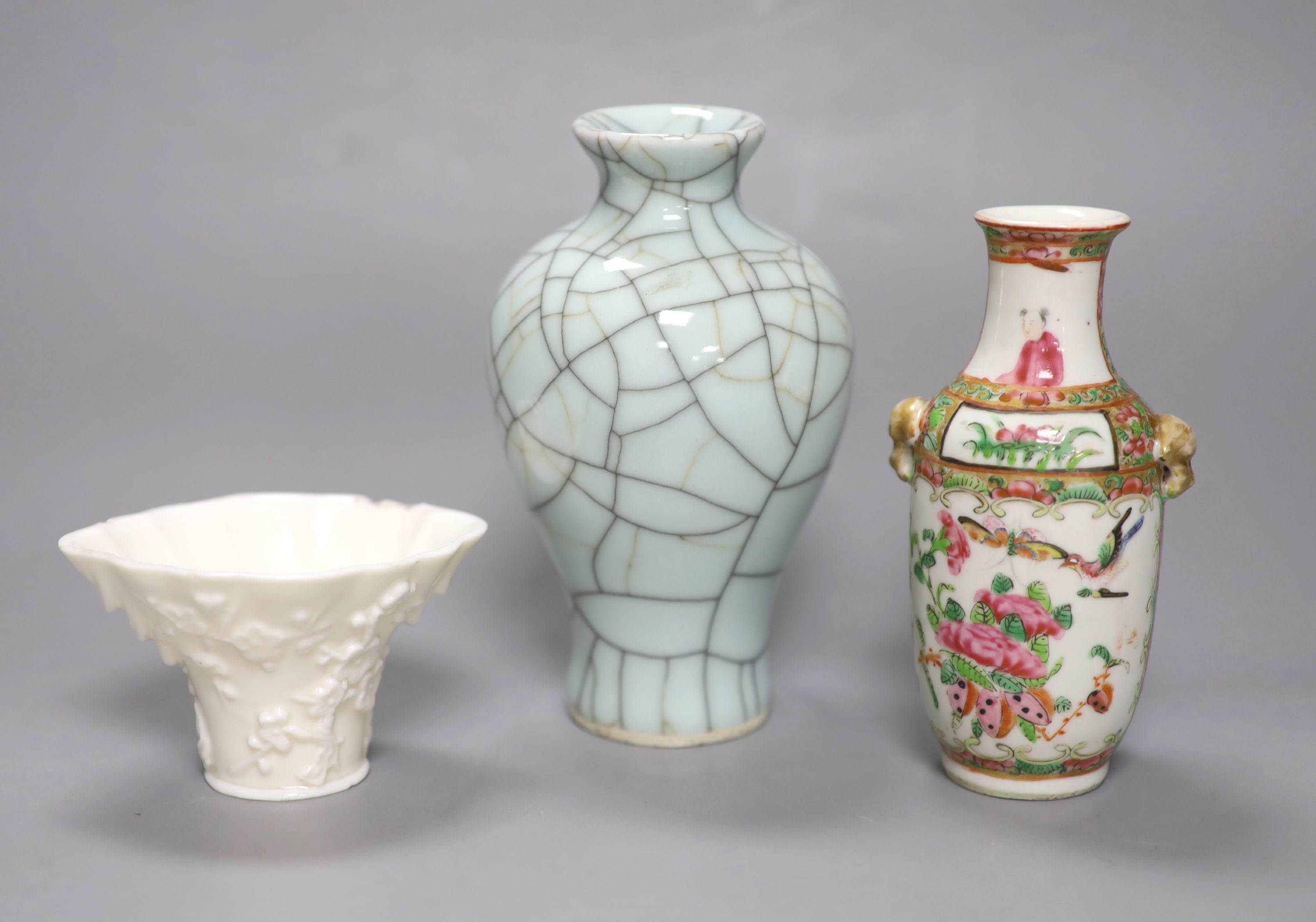 A Chinese white glazed libation cup, a similar famille rose vase and a crackle glaze vase, tallest 16cm